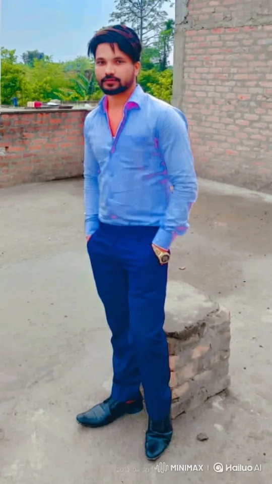 Man in Blue Shirt Stands Confidently, Smiles Slightly – AI Generated Video | Hailuo AI