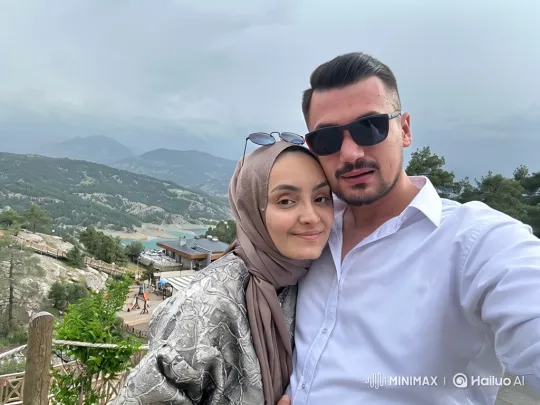 Young Couple Embraces in Scenic Mountain Setting – AI Generated Video | Hailuo AI