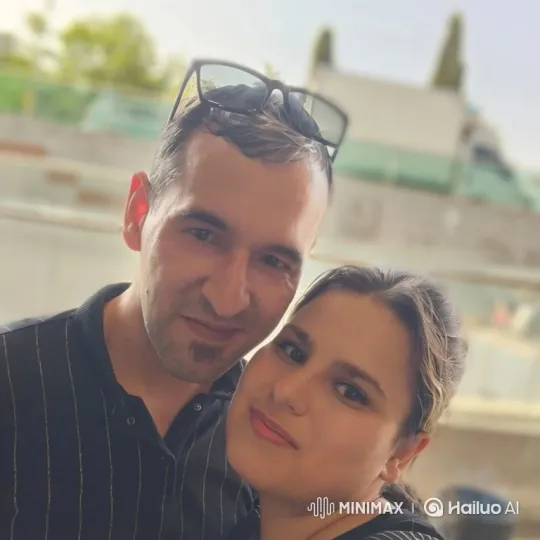 Family Portrait: Man, Woman, and Child's Joyful Embrace – AI Generated Video | Hailuo AI