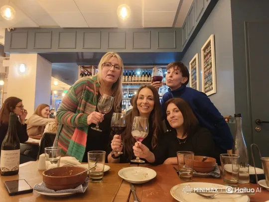 Four Friends Celebrate with Wine in a Warm Restaurant – AI Generated Video | Hailuo AI