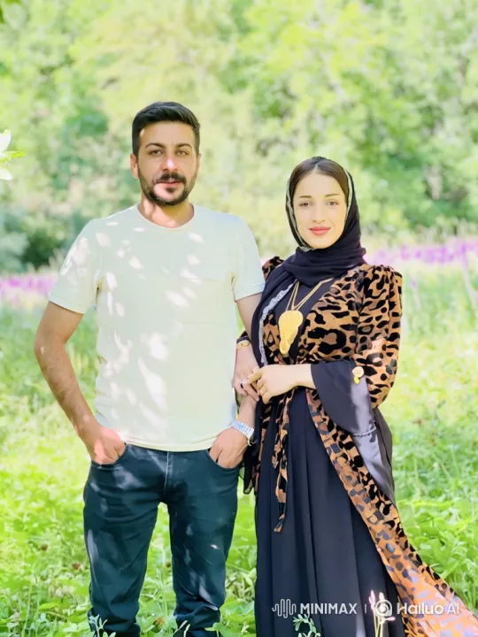 Couple in Serene Pose in Lush Field – AI Generated Video | Hailuo AI
