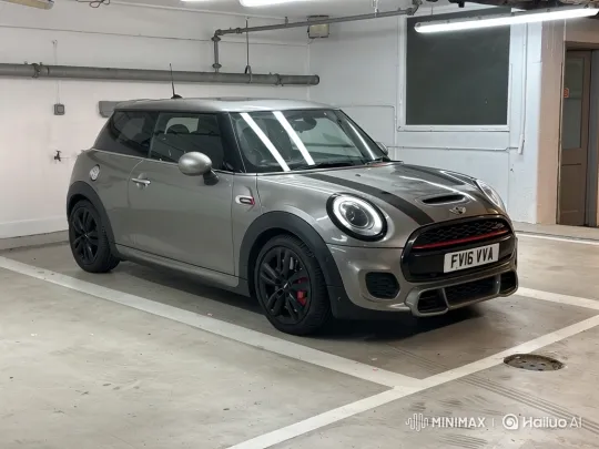 Mini Cooper Showcase in Industrial Garage Setting – AI Generated Video | Hailuo AI