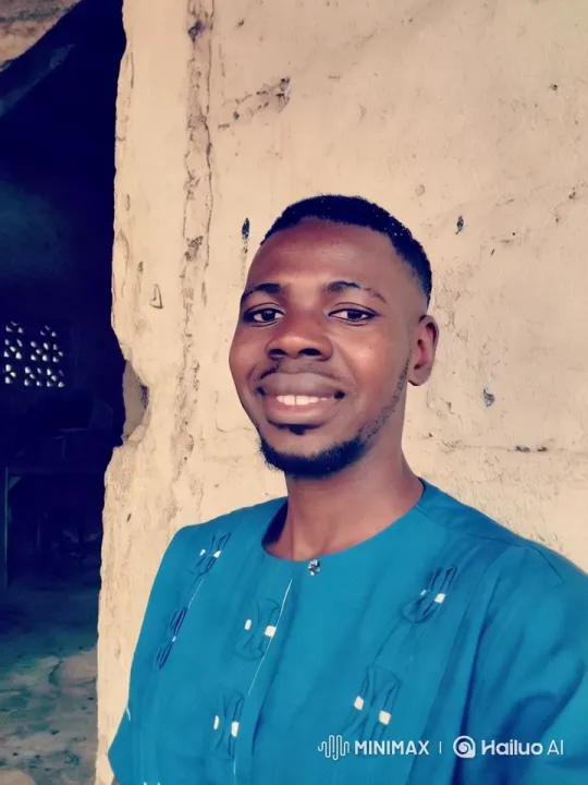 Man in Blue Traditional Attire in Dimly Lit Room – AI Generated Video | Hailuo AI