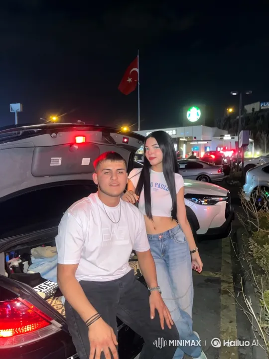 Family Embraces in Parking Lot at Night – AI Generated Video | Hailuo AI