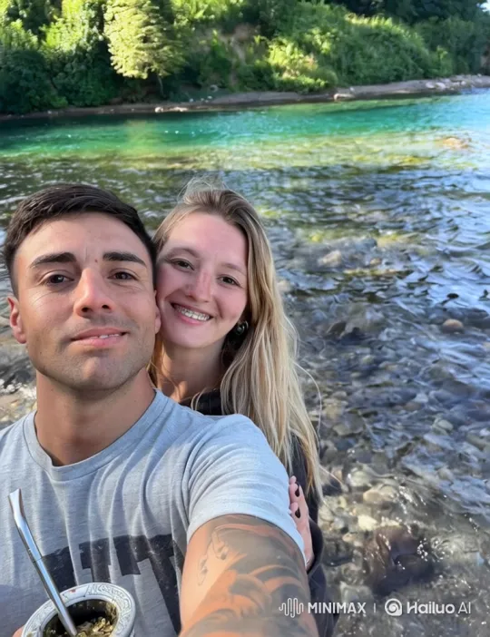 Family Embraces by River in Heartwarming Moment – AI Generated Video | Hailuo AI