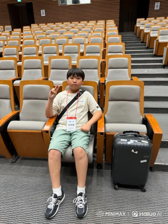 Boy Joyfully Dancing Alone in Empty Auditorium – AI Generated Video | Hailuo AI