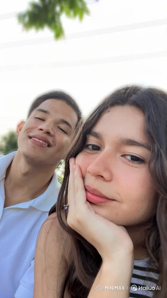 Family Embrace in Sunlit Park Setting – AI Generated Video | Hailuo AI