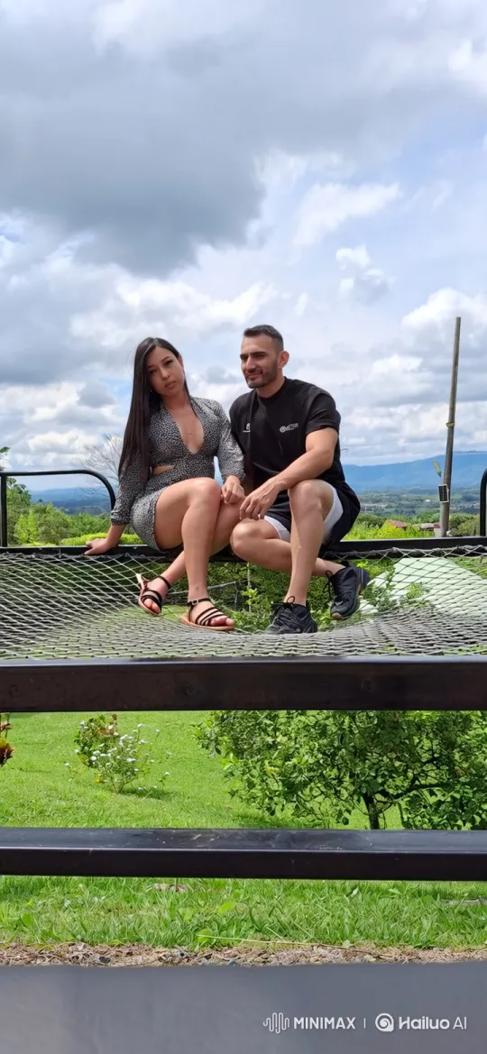 Family Embrace on a Scenic Net Platform – AI Generated Video | Hailuo AI