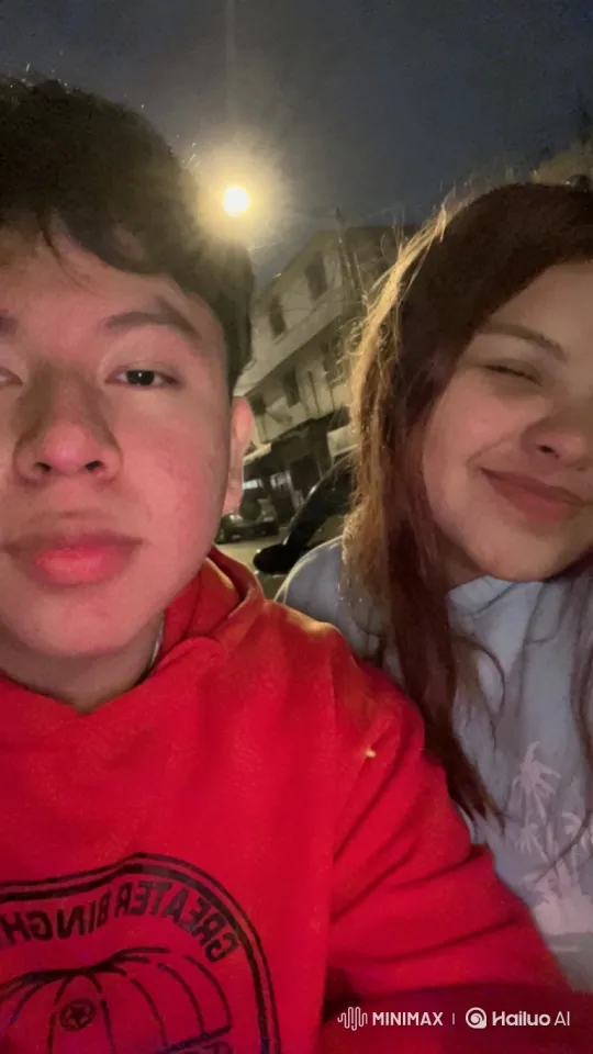 Young Couple Embraced by Child in Heartwarming Street Selfie – AI Generated Video | Hailuo AI