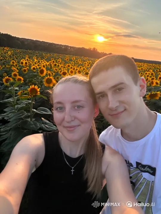 Couple in Sunflower Field at Sunset – AI Generated Video | Hailuo AI