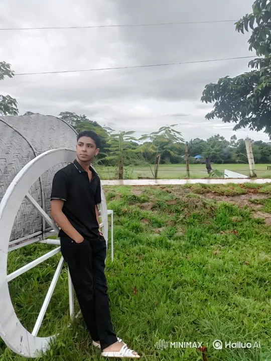 Young Man Reflects in Serene Outdoor Setting – AI Generated Video | Hailuo AI