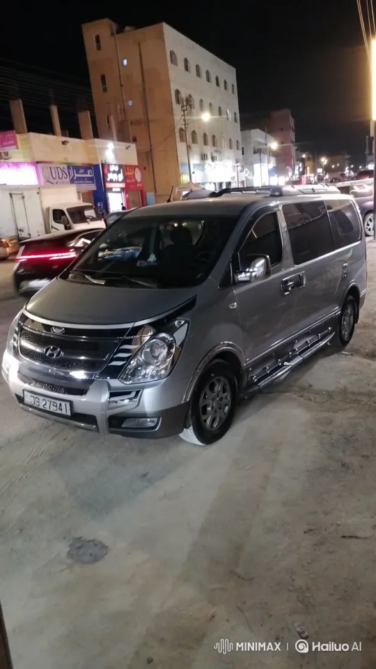 Sleek Van Shines in Nocturnal Cityscape – AI Generated Video | Hailuo AI