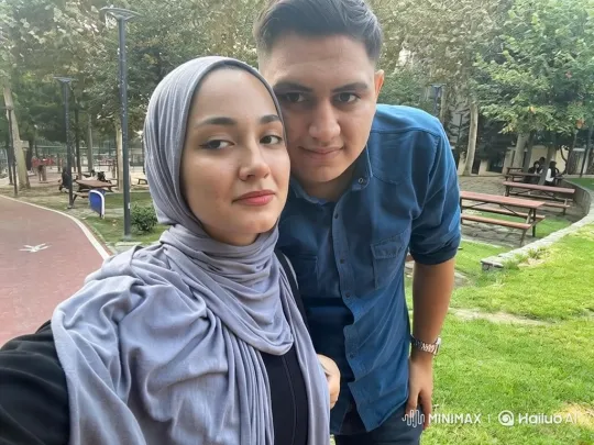Family Embrace Captured in Park Setting – AI Generated Video | Hailuo AI