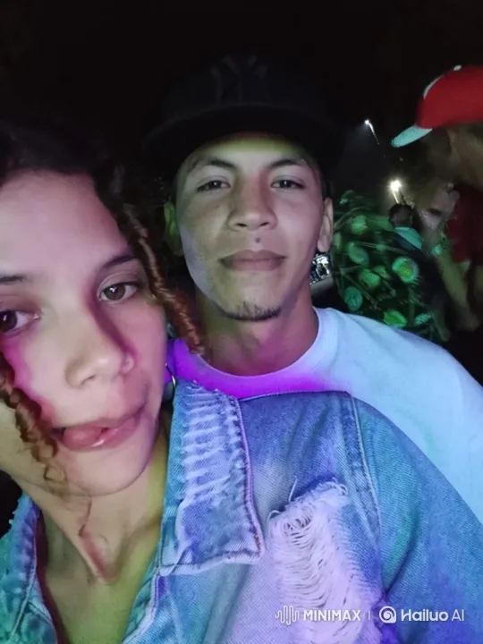 Young Family Captured in Candid Nighttime Moment – AI Generated Video | Hailuo AI