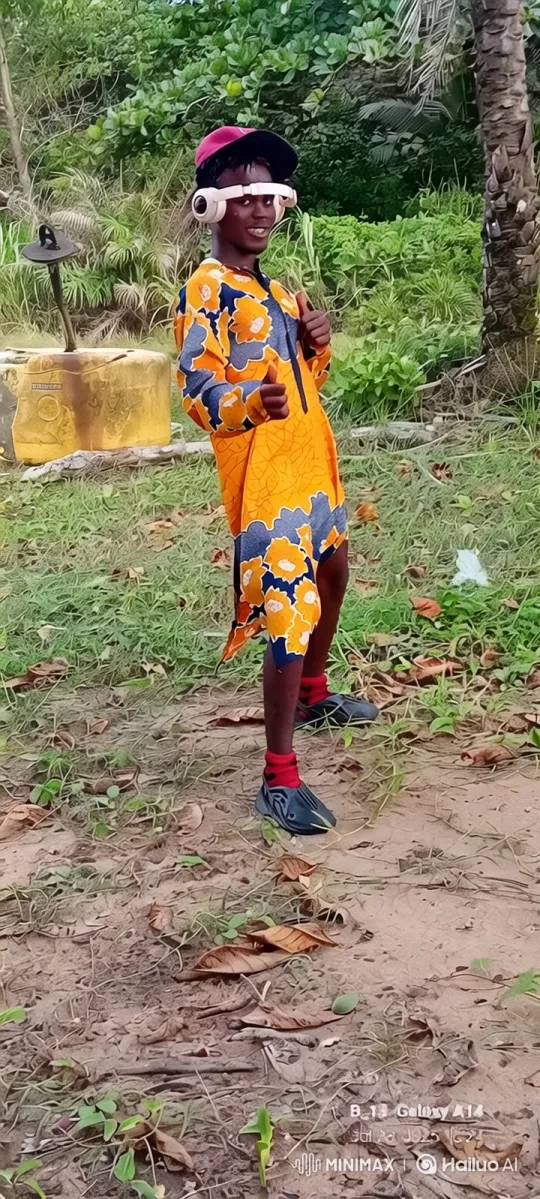 Young Man in Colorful Outfit Walks Through Greenery – AI Generated Video | Hailuo AI