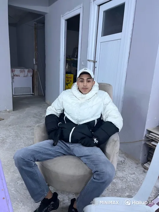 Young Man Handcuffed by Police in Empty Room – AI Generated Video | Hailuo AI