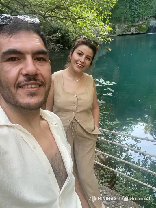 Family Embrace by Serene Waterfall – AI Generated Video | Hailuo AI