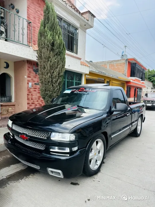Custom Pickup Truck Lowers on Driveway – AI Generated Video | Hailuo AI