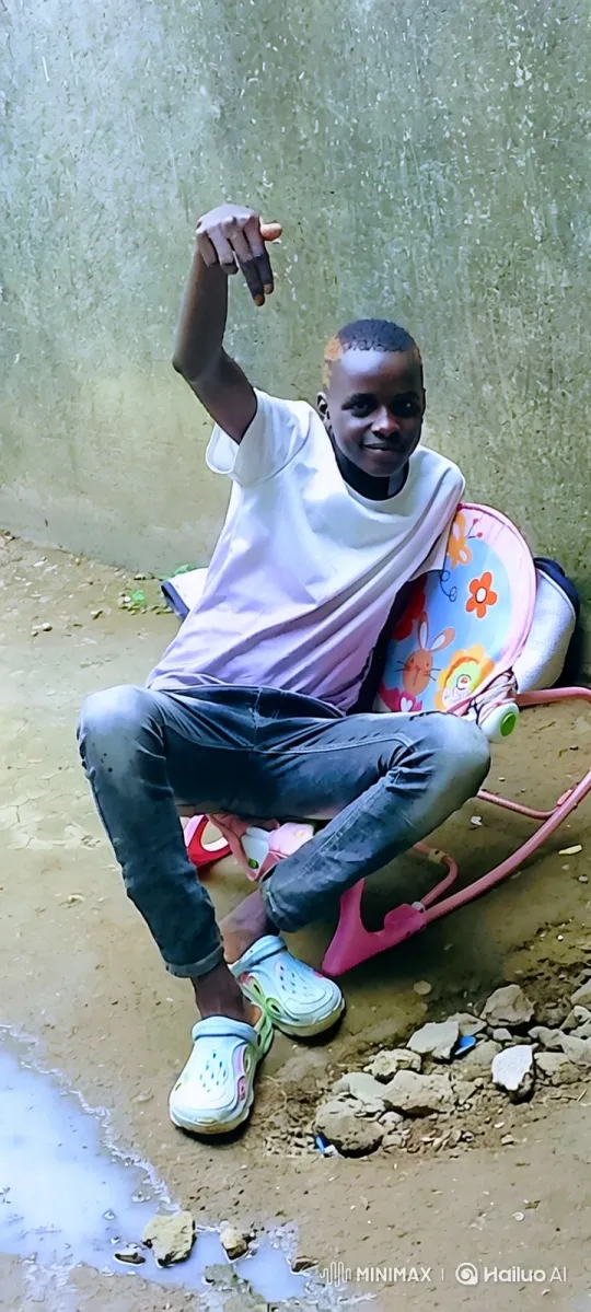 Young Black Person Smiles in Bouncer, Rocks Gently – AI Generated Video | Hailuo AI