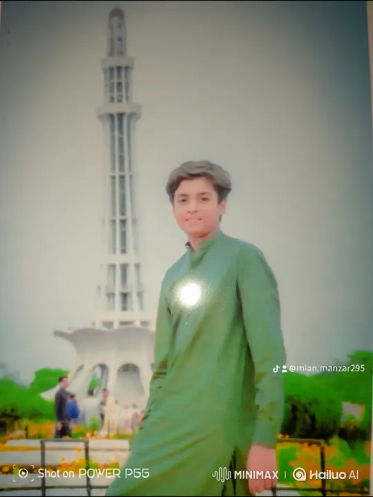 Young Man at Monument Amidst Gentle Breeze – AI Generated Video | Hailuo AI