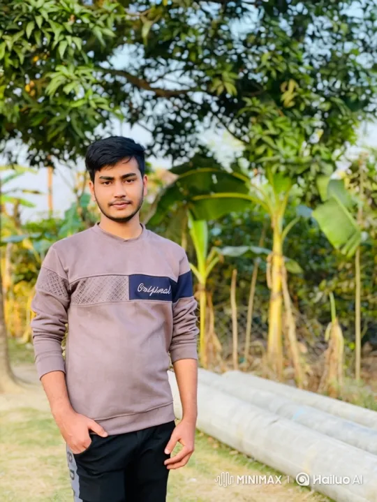 Young Man in Lush Greenery, Animated with Gentle Smile – AI Generated Video | Hailuo AI