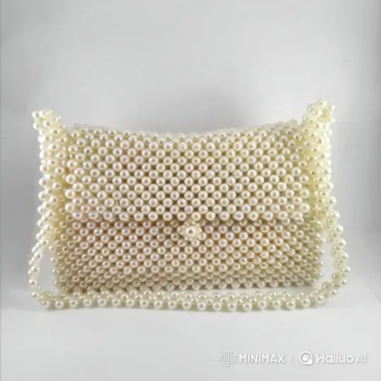 Luxurious Handbag with Cream-Colored Pearls Showcased – AI Generated Video | Hailuo AI