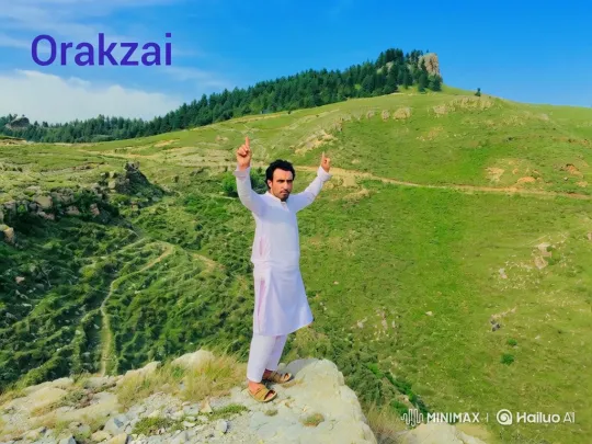 Man Poses Proudly on Orakzai Cliff with Panoramic View – AI Generated Video | Hailuo AI