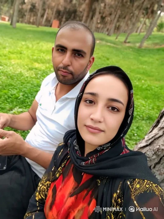 Family Moment in Sunlit Park – AI Generated Video | Hailuo AI