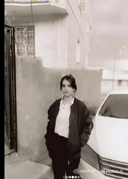 Young Woman's Serene Smile in a Sepia-Toned Scene – AI Generated Video | Hailuo AI
