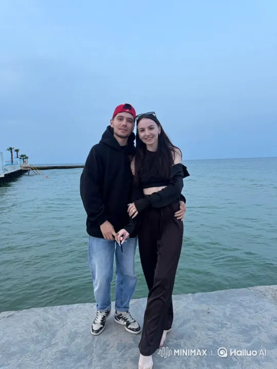 Young Family's Intimate Moment Captured on Vertical Video – AI Generated Video | Hailuo AI