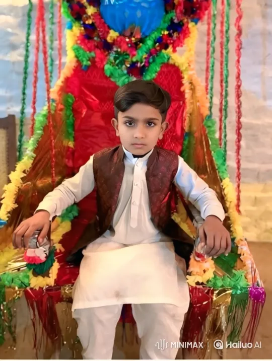 Young Boy in Colorful Chair with Steady Gaze – AI Generated Video | Hailuo AI