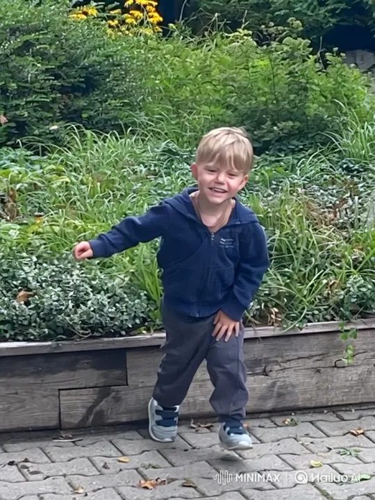Young Boy Joyfully Performs Backflip on Cobblestone Path – AI Generated Video | Hailuo AI