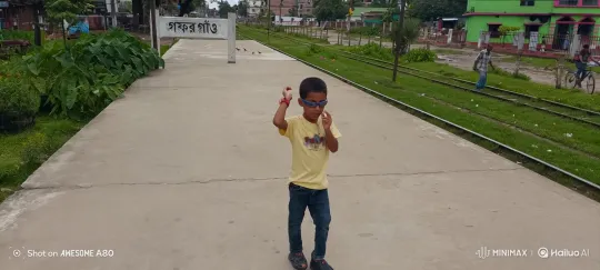 Young Boy at a Quiet Train Station with Gentle Movements – AI Generated Video | Hailuo AI