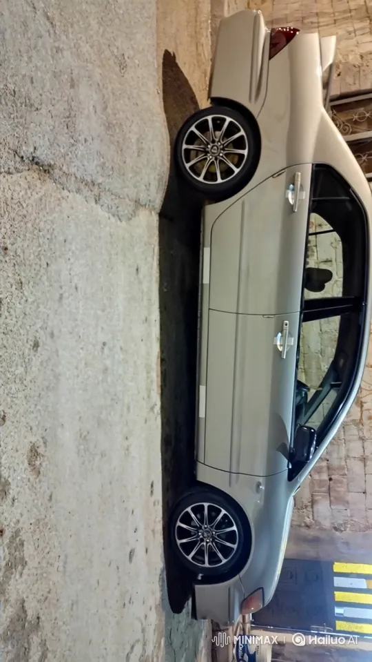 Silver Sedan Demonstrates Air Suspension Movement – AI Generated Video | Hailuo AI