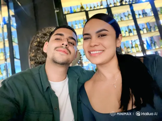 Family Embraces in Warmly Lit Restaurant – AI Generated Video | Hailuo AI
