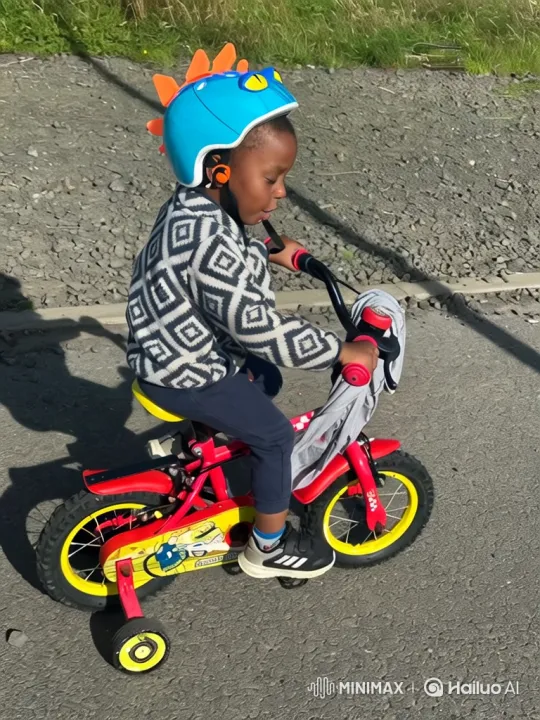 Boy Receives Trophy After Bicycle Ride Through Admiring Crowd – AI Generated Video | Hailuo AI
