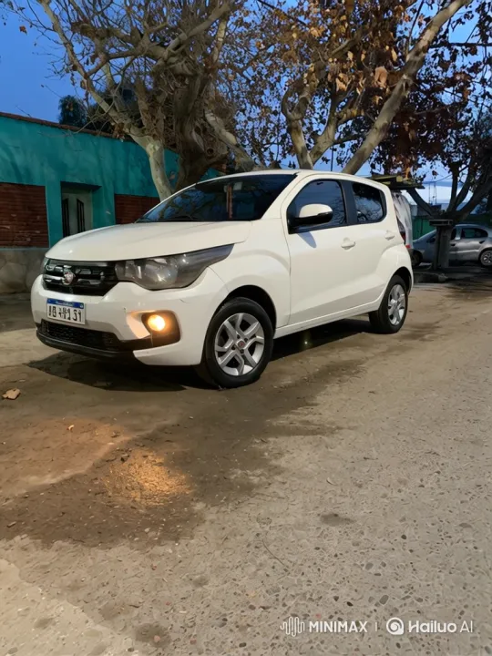 White Hatchback Lowering on Damp Street at Dusk – AI Generated Video | Hailuo AI