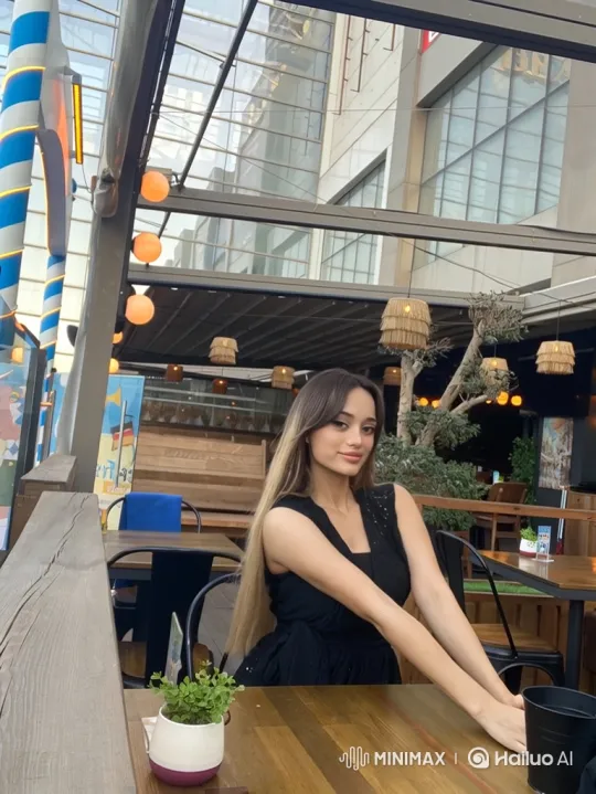 Young Woman Dances Gracefully on Restaurant Patio – AI Generated Video | Hailuo AI