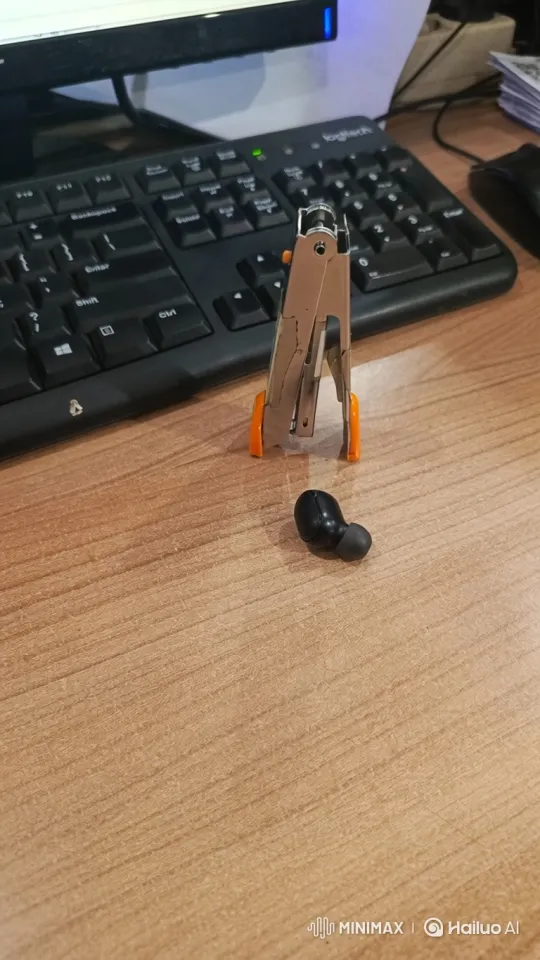 Animated Stapler 'Walks' with Earbud – AI Generated Video | Hailuo AI