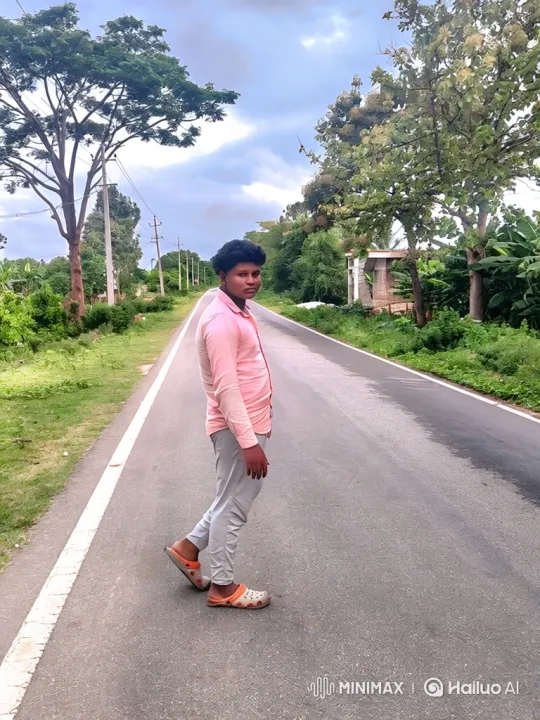Young Man Walks Down Rural Road in Neutral Mood – AI Generated Video | Hailuo AI