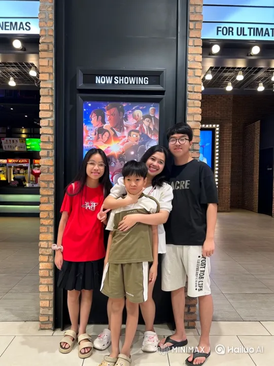 Four Individuals Share Joyful Moment at Cinema – AI Generated Video | Hailuo AI
