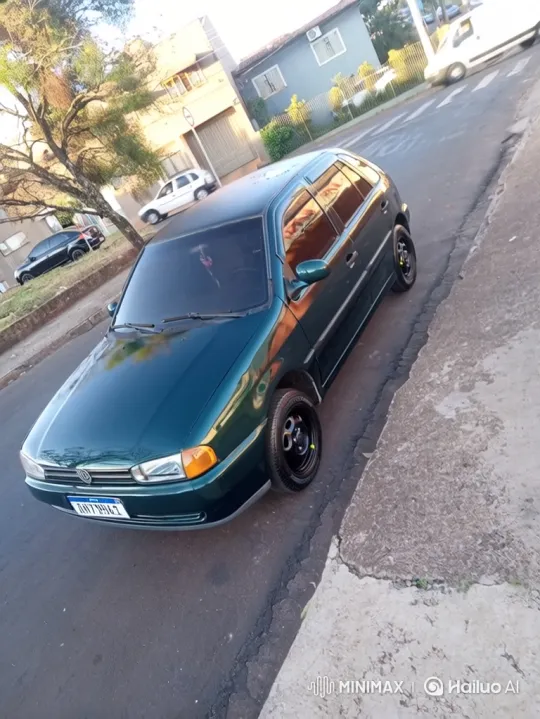 Tranquil Street Scene with Shimmering Green Hatchback – AI Generated Video | Hailuo AI