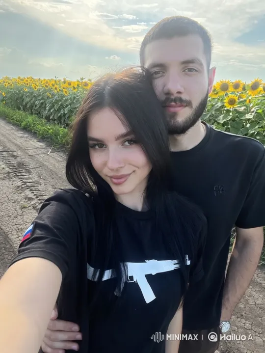 Young Family Embraces in Sunflower Field – AI Generated Video | Hailuo AI