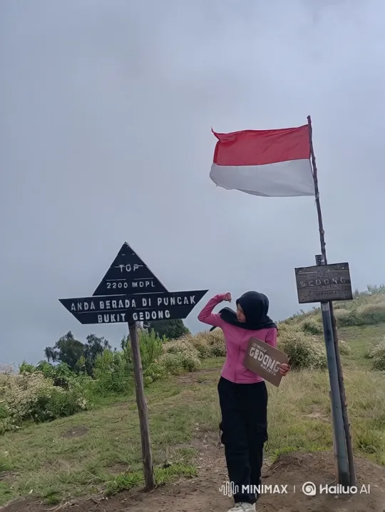Woman Reaches Summit in Indonesia, Celebrates Victory – AI Generated Video | Hailuo AI