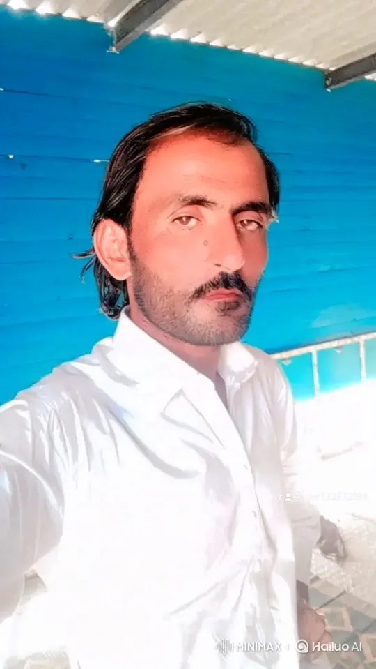 Man in White Shirt: A Study in Subtle Movement – AI Generated Video | Hailuo AI