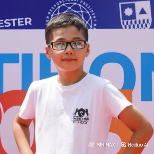 Young Boy Enjoys Dancing in Front of Event Banner – AI Generated Video | Hailuo AI
