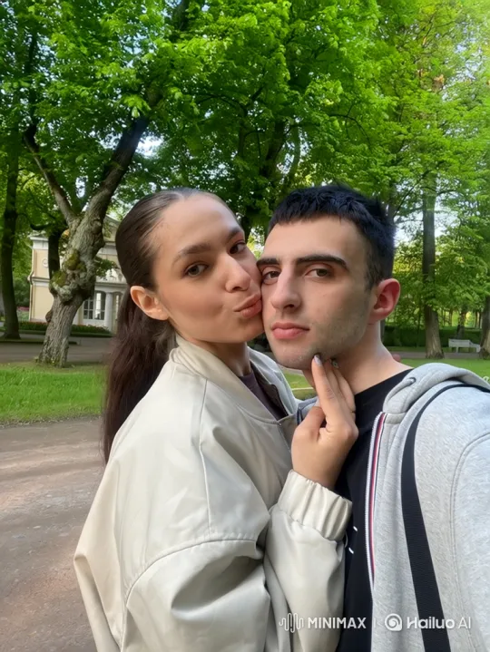 Young Family Embraces in Park - Heartfelt Moment – AI Generated Video | Hailuo AI