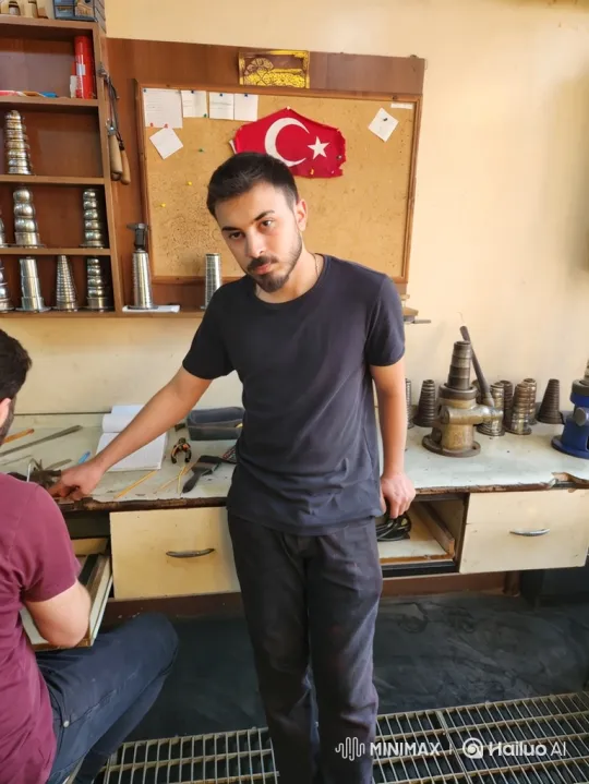 Young Man in Workshop Dances Twerking – AI Generated Video | Hailuo AI