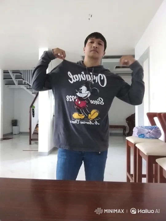 Asian Man Walks Along Sandy Beach at Sunset – AI Generated Video | Hailuo AI