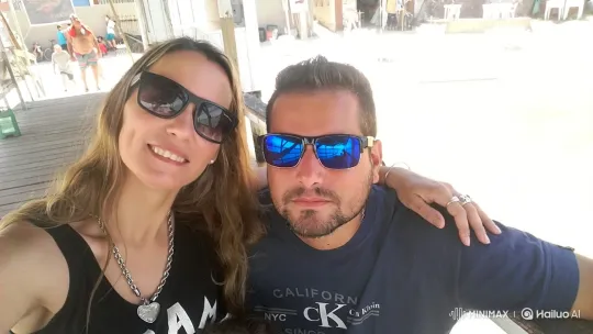 Family Portrait: Couple and Child on Sunny Boardwalk – AI Generated Video | Hailuo AI